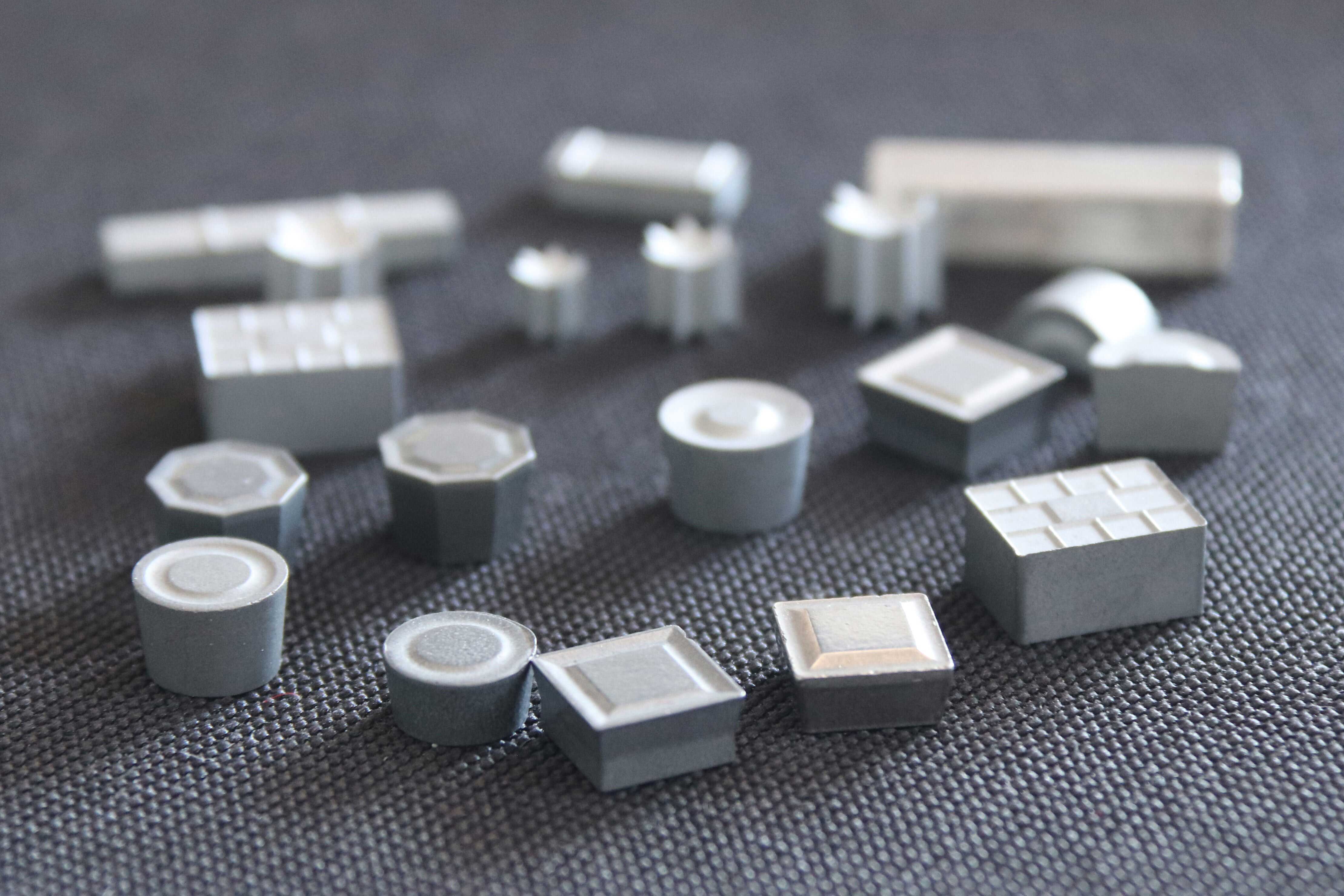 Tungsten Carbide Wear Inserts for Downhole Tool Dressing